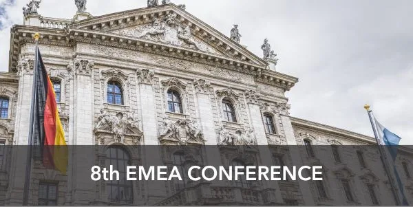 Banner: 8th EMEA conference, background with main Munich white building with Germany flag