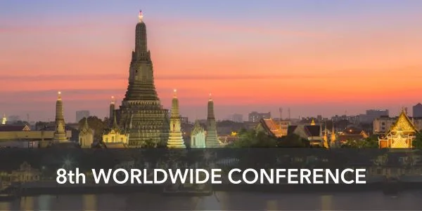 Banner: 8th Worldwide  conference, background with bangkok landscape in the sunset