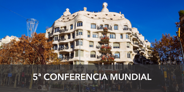 Banner: 5th worldwide conference. Backgroud is the Pedrera building.